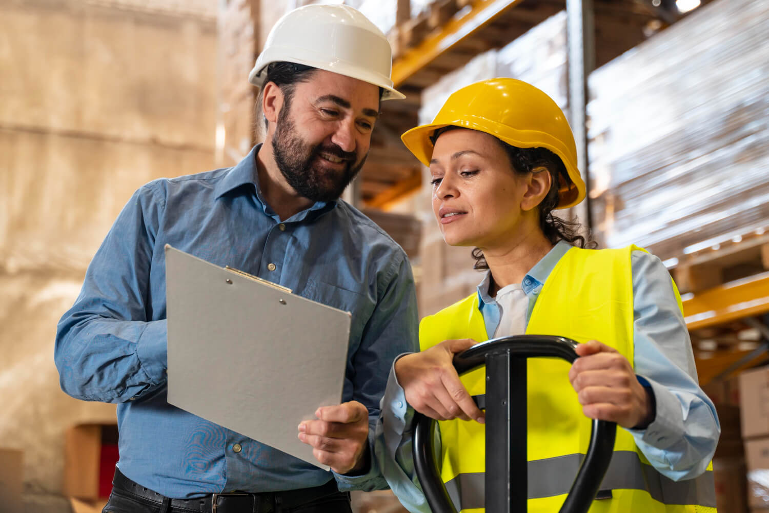 Team work employees in warehouse working on small business and workers compensation