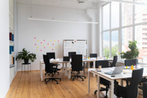 Empty room with chairs and desks to explain the types of commercial leases